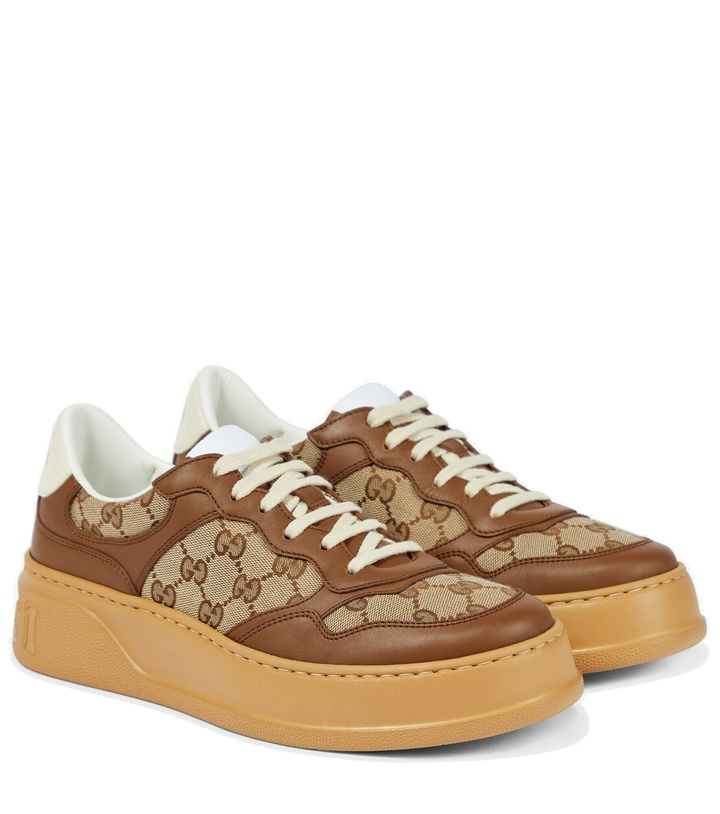 Photo: Gucci - GG Canvas leather-trimmed sneakers