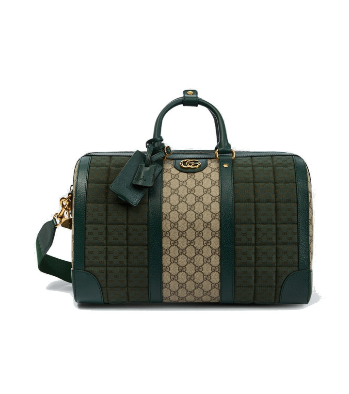 Photo: Gucci Mini GG Small leather-trimmed duffel bag