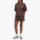 New Balance Women's Linear Heritage French Terry Collared Shirt in Black Coffee