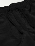 WTAPS - Logo-Print Tapered Nylon Drawstring Trousers - Black
