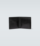 Gucci - Embossed GG leather wallet