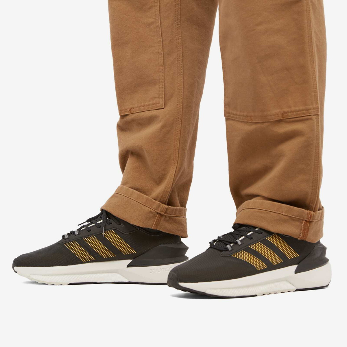 Adidas Men's Avryn Sneakers in Core Black/Solar Gold adidas