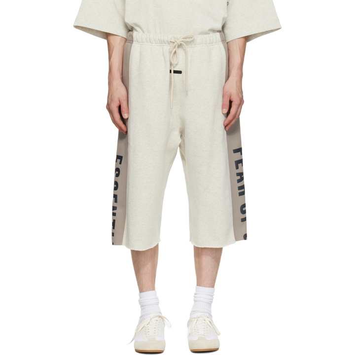 Photo: Fear of God ESSENTIALS Beige & Gray Panelled Raw Cut Off Sweat Shorts