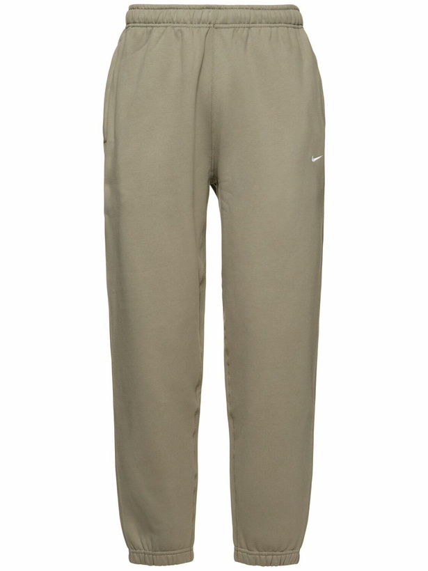Photo: NIKE Solo Swoosh Pants