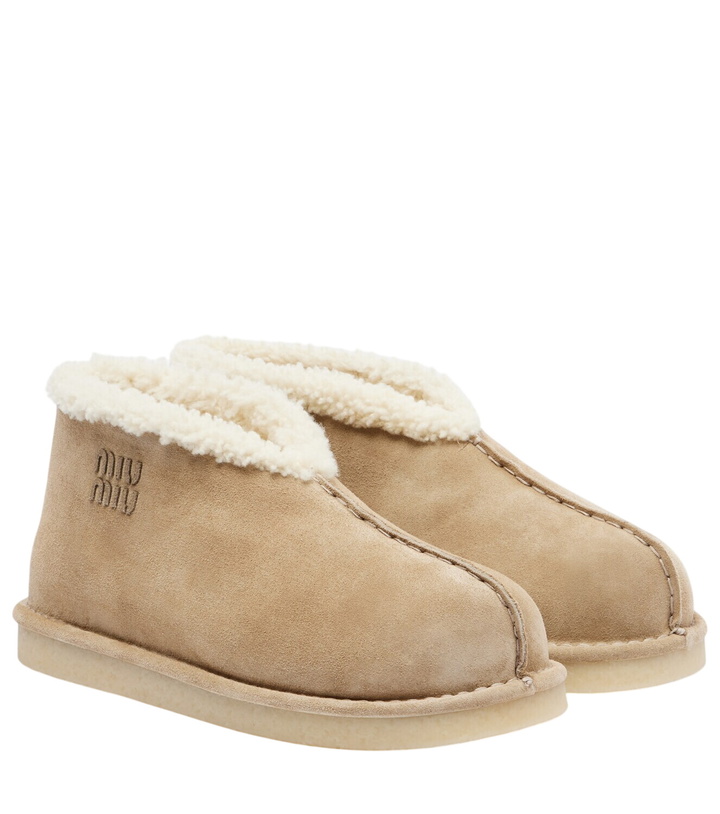 Photo: Miu Miu Shearling-lined suede ankle boots
