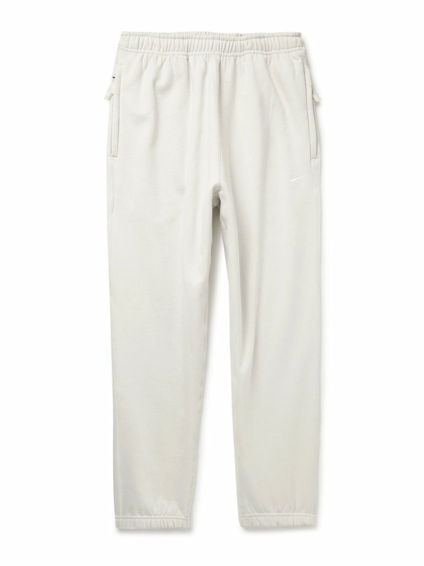 Photo: Nike - Solo Swoosh Tapered Logo-Embroidered Cotton-Blend Jersey Sweatpants - Neutrals