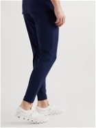 Castore - Slim-Fit Tapered Logo-Print Stretch-Shell Trousers - Blue