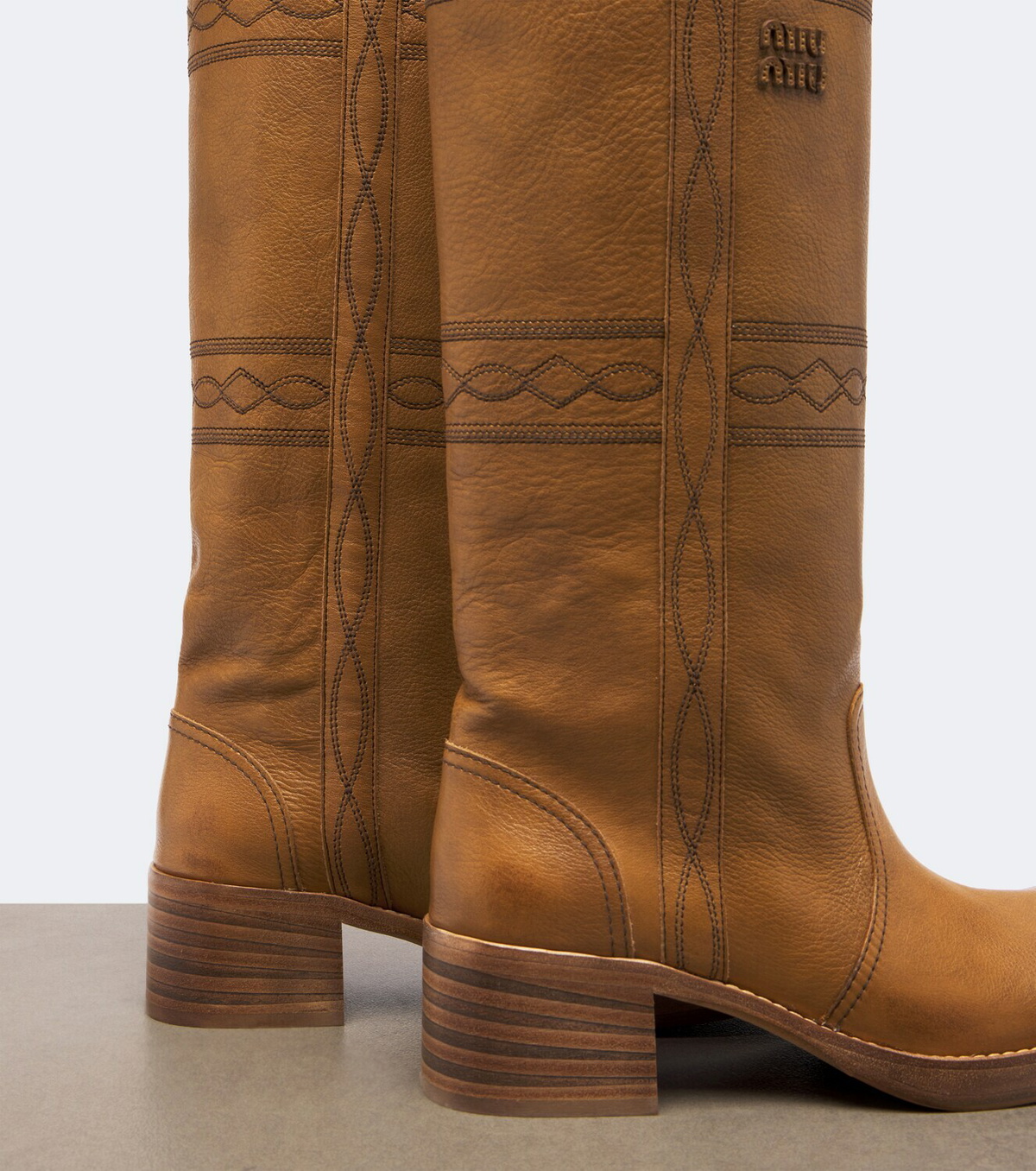 Miu Miu Embroidered leather knee-high boots