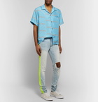 AMIRI - Broken Painter Skinny-Fit Neon-Striped Distressed Stretch-Denim Jeans - Light blue