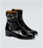 Gucci Buckled patent leather boots