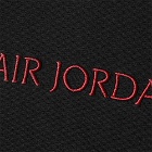 Air Jordan Men's Wordmark Fleece T-Shirt in Black/Gym Red