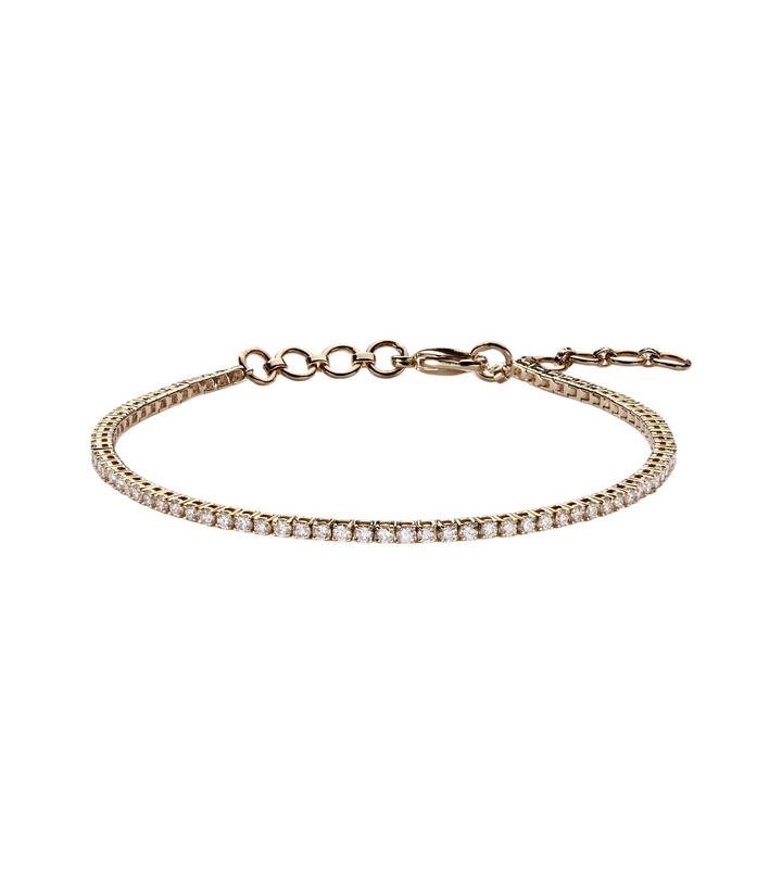 Photo: Stone and Strand 14kt gold bracelet with diamonds