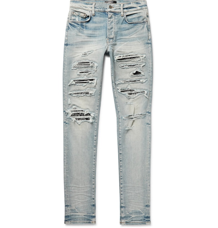 Photo: AMIRI - Thrasher Skinny-Fit Distressed Panelled Stretch-Denim Jeans - Blue