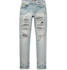AMIRI - Thrasher Skinny-Fit Distressed Panelled Stretch-Denim Jeans - Blue