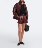 Arma High-rise leather shorts