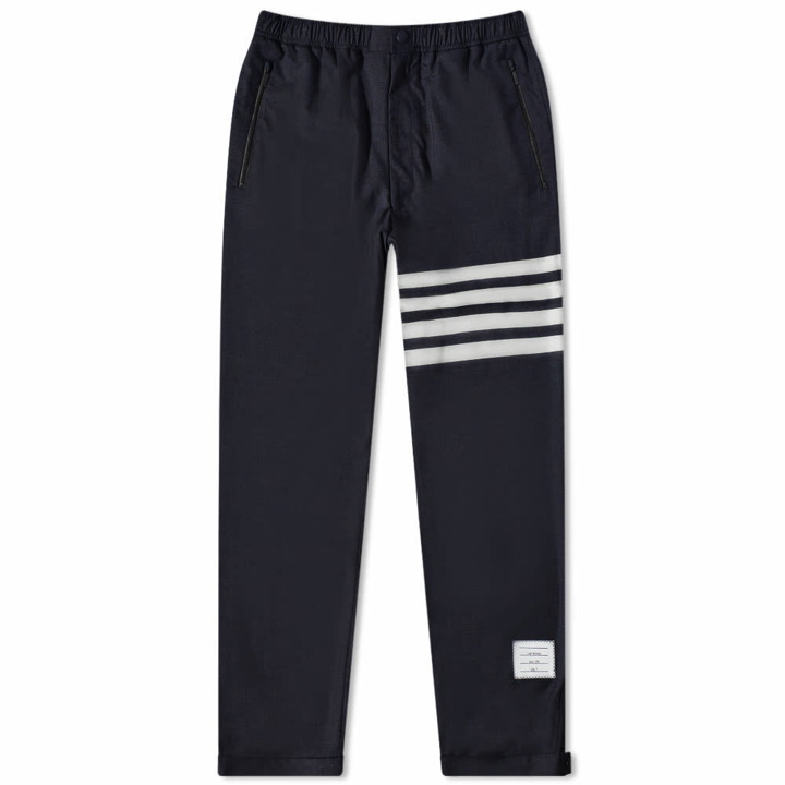 Photo: Thom Browne Men's 4 Bar Engineered Stripe Trouser in Navy