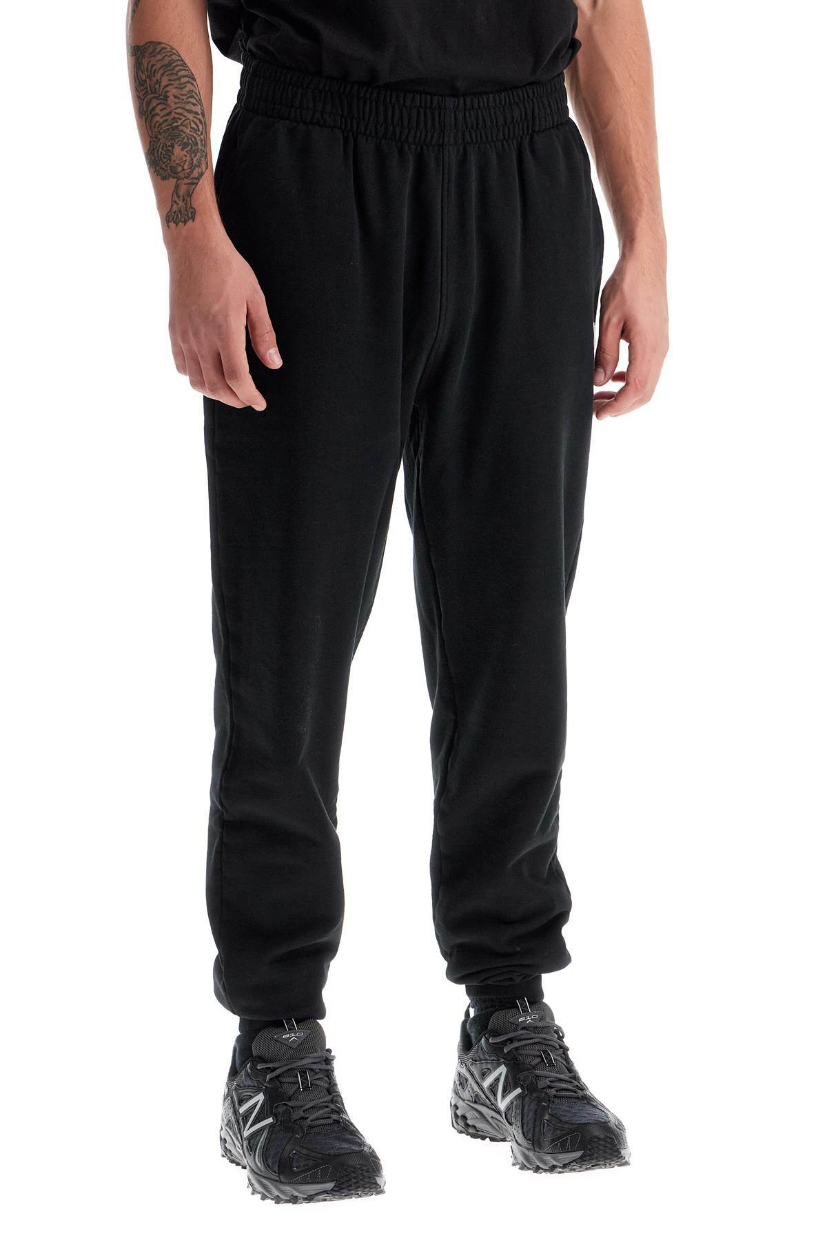 MAISON KITSUNE fox head jogging pants Black