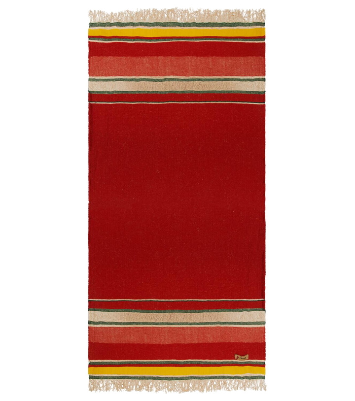 Photo: The House of Lyria Xoroi striped wool-blend throw