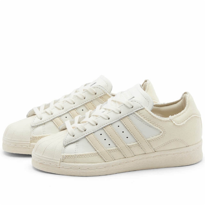 Photo: Adidas Superstar 82 Recon Sneakers in Core White/Wonder White