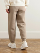 AMI PARIS - Tapered Logo-Embossed Cotton-Blend Sweatpants - Neutrals