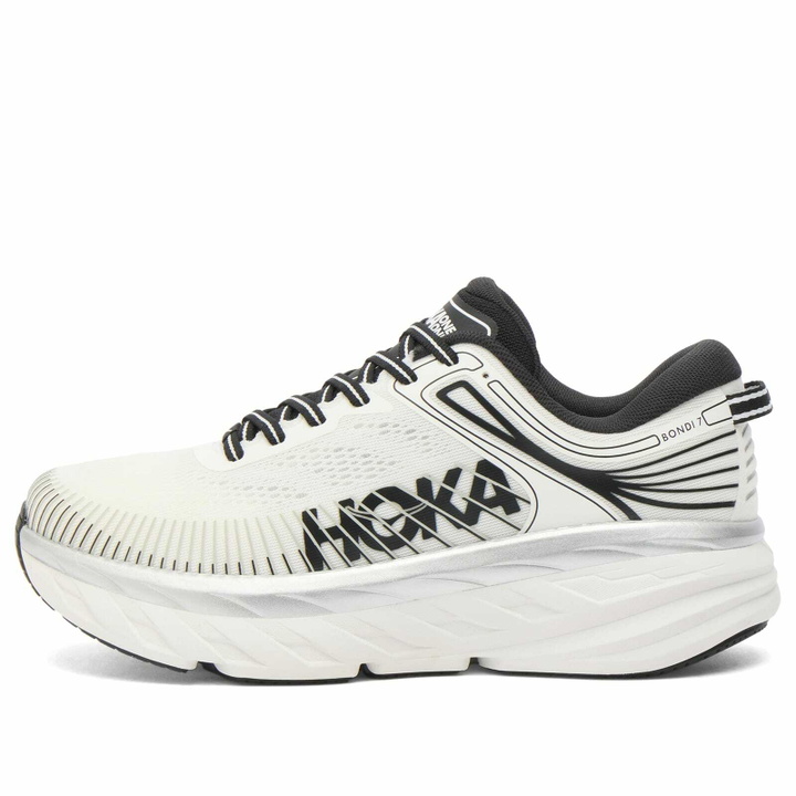 Photo: HOKA ONE ONE Women's Bondi 7 Sneaker in White/Black