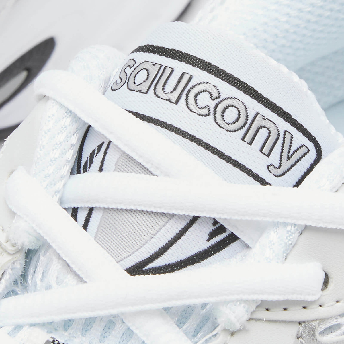 Saucony Ride Millennium Sneakers in White/Silver