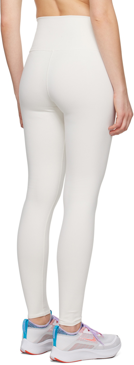 Off-White Solid Acrylic Mid Rise Ankle Length Skinny Fit Leggings main image 1