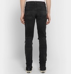 AMIRI - MX1 Skinny-Fit Panelled Distressed Stretch-Denim Jeans - Black