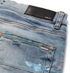 AMIRI - Skinny-Fit Distressed Paint-Splattered Stretch-Denim Jeans - Light blue