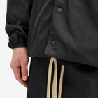Fear of God ESSENTIALS Men's Textured Nylon Hooded Coach Jacket in Black