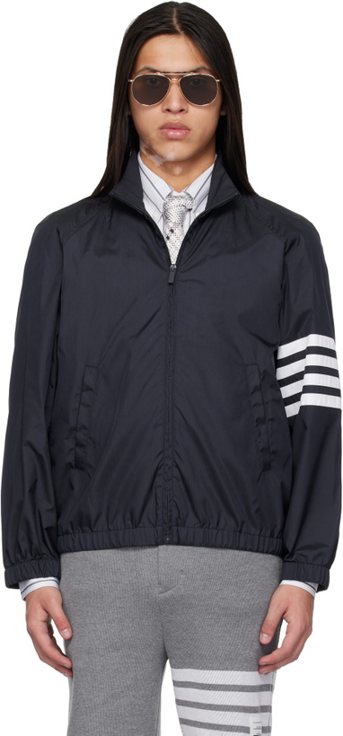 Photo: Thom Browne Navy Shiny Ripstop Raglan 4-Bar Track Jacket