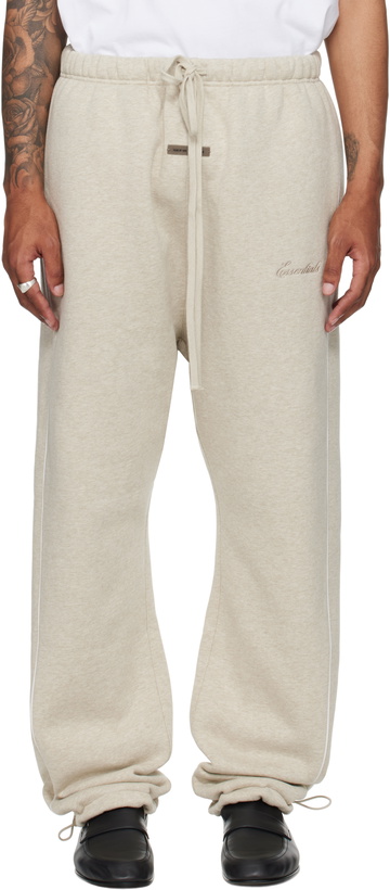 Photo: Fear of God ESSENTIALS Beige Relaxed Fleece Piping Sweatpants