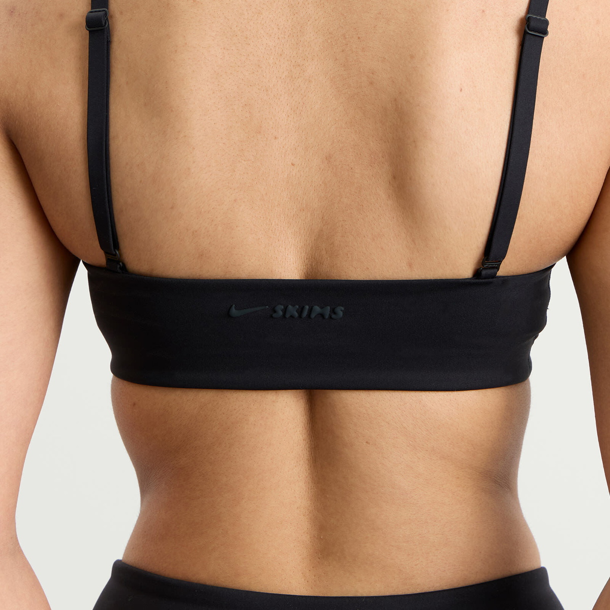 Nike Women's x SKIMS Matte Micro Scoop Bra in Obsidian