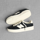 New Balance Men's 750 Sneaker in Black/Angora