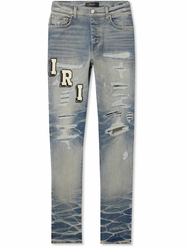 Photo: AMIRI - Skinny-Fit Logo-Appliquéd Distressed Jeans - Blue