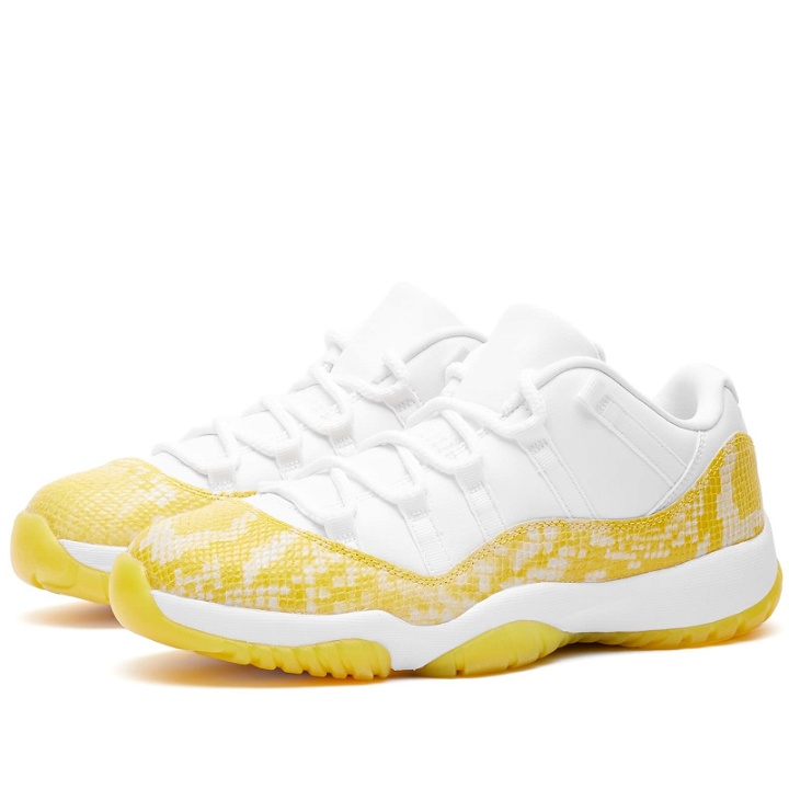 Photo: Air Jordan Women's W 11 Retro Low Sneakers in White/Tour Yellow/White