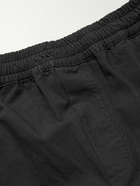 Folk - Assembly Tapered Pleated Stretch Organic Cotton-Ripstop Trousers - Black