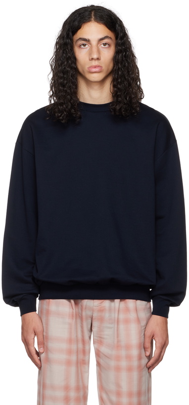 Photo: AURALEE Navy Crewneck Sweatshirt