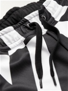 Valentino - Tapered Logo-Print Jersey Sweatpants - Black