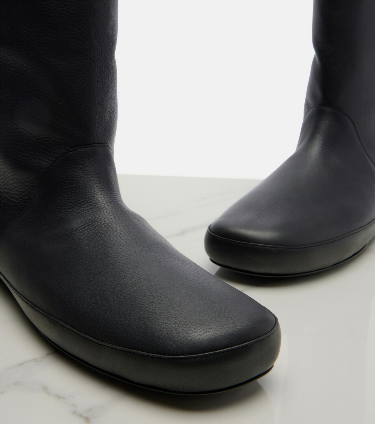 The Row Toni shearling-lined leather ankle boots