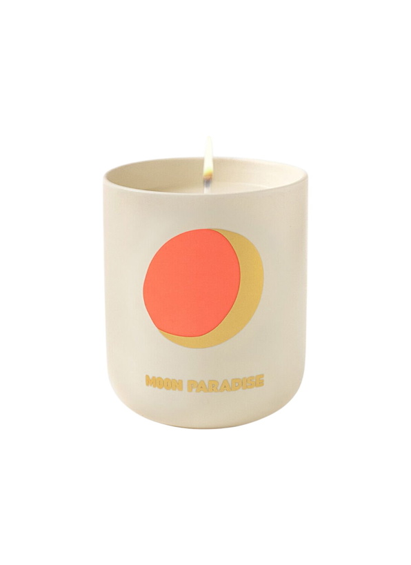 Photo: Assouline Moon Paradise Travel Candle