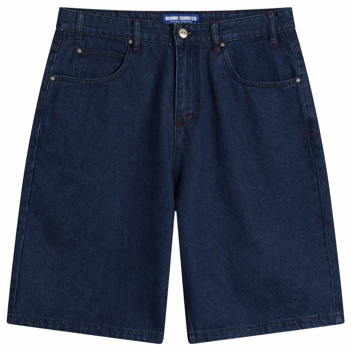 Photo: Butter Goods Men's Drummer Baggy Denim Shorts in Raw Dark Indigo