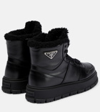 Prada Shearling-trimmed leather ankle boots