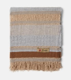The House of Lyria Xoroi striped jute and wool-blend throw