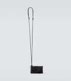 Saint Laurent Cassandre Mini leather-trimmed crossbody bag