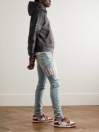 AMIRI - Skinny-Fit Logo-Appliquéd Distressed Jeans - Blue
