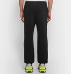 Balenciaga - Tapered Logo-Print Loopback Cotton-Jersey Sweatpants - Black