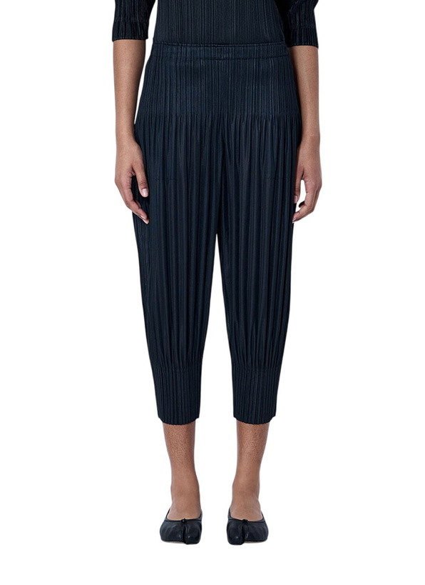 Photo: Pleats Please Issey Miyake Pleated Cropped Trousers