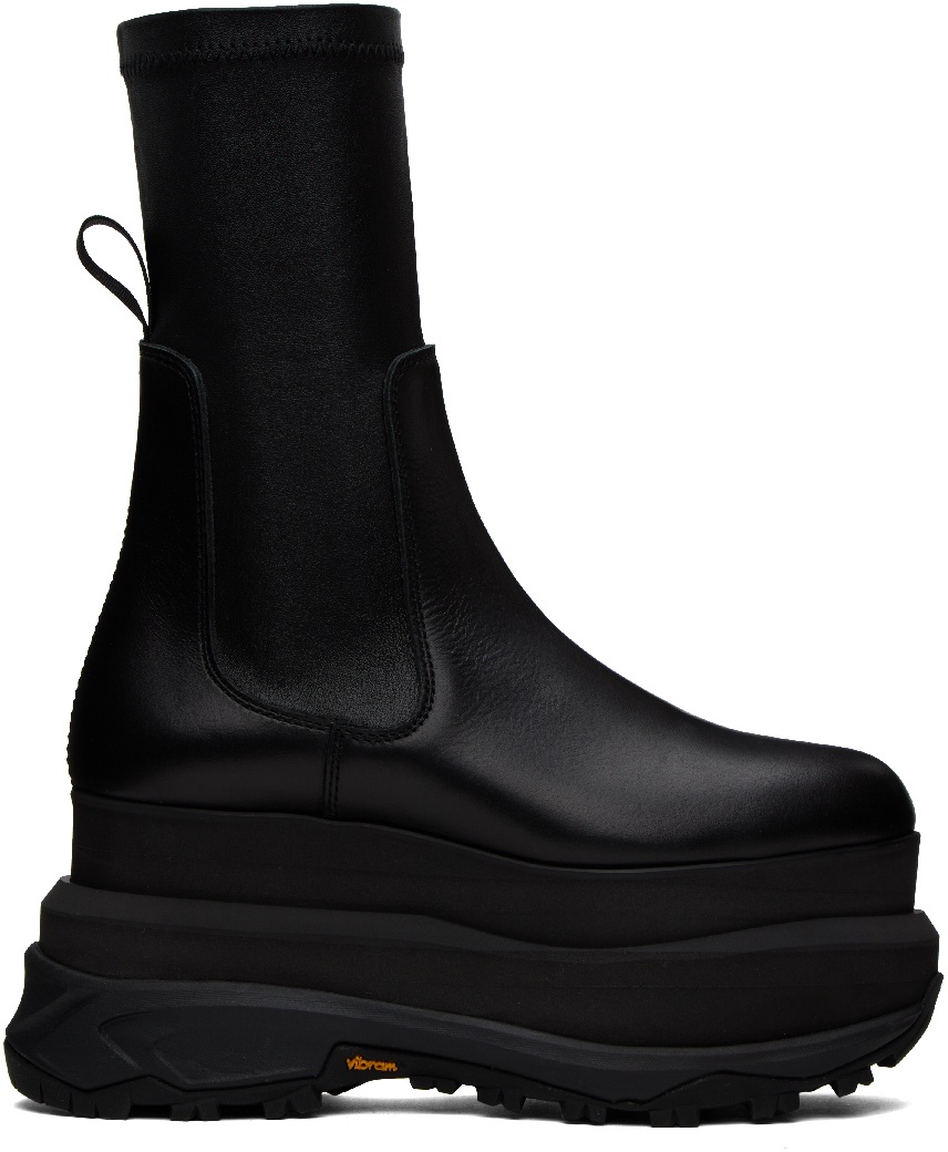 Photo: sacai Black Zip Boots