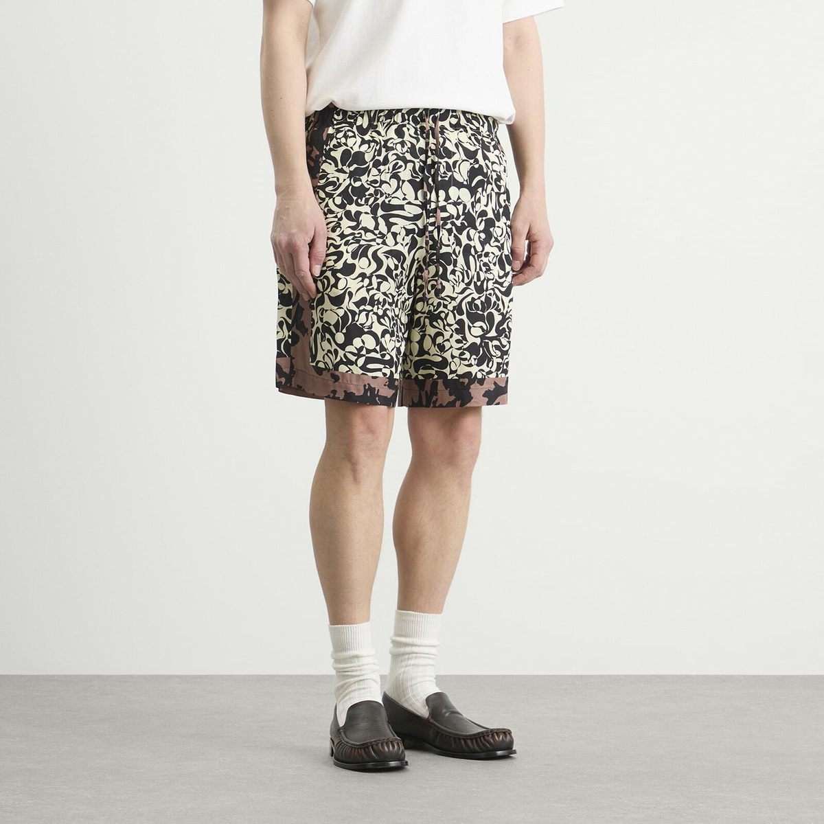 Dries Van Noten Men's Squiggle Border Print Shorts in Black